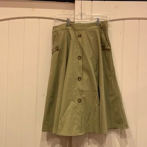 Green skirt with buttons